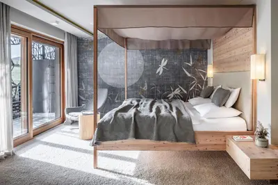 a bedroom with a bed with a canopy at SILENA, your soulful hotel - adults only in Valles