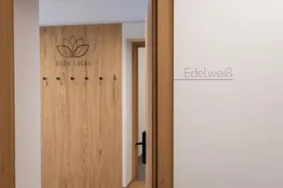 a door with a sign that says edgewood on it at Beim Lackl in Avelengo