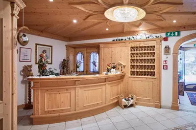a large kitchen with a large island in a house at Alpenhotel Schönwald Superior in Valles