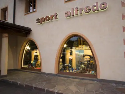 a store front of a store with the words sport allied at Residence Rottonara in Corvara in Badia