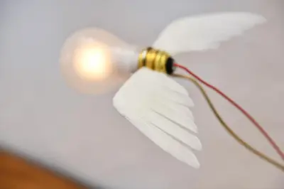 a white ceiling fan with a light on it at Casa Piganò in Appiano sulla Strada del Vino