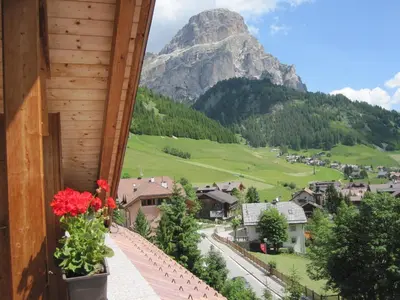 a balcony with a view of a mountain at Hotel Borest in Colfosco
