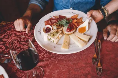 a plate of food on top of a table at Albergo Centrale in San Martino di Castrozza