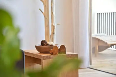 a bowl of nuts on a table in a living room at Anger living in Laion