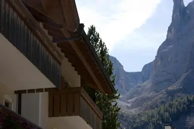 a building with a view of a canyon at Pensione Sellablick in Colfosco