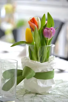 a vase filled with colorful flowers on a table at Hotel Stefanshof in Plaus