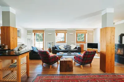 a living room with a couch and a table at Casa Zilli in La Villa