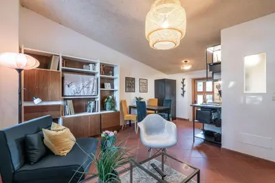 a living room with a couch and a table at Schloss-Castel Pienzenau - Guestrooms & Apartments - B&B-Hotel & Restaurant in Merano