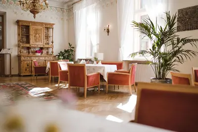 a dining room with a table and chairs at Hotel Monte Sella in San Vigilio Di Marebbe