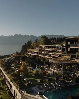 an aerial view of a resort with a pool at Chalet Mirabell in Avelengo