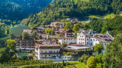 a small town on a hill with houses at Hotel Saltauserhof in Saltusio