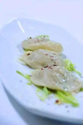 a plate of food on a white plate at Hotel Alpenhof in Ultimo
