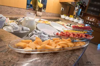 a counter top with a bunch of fruit on it at Kreuzstein Bed&Breakfast in Appiano sulla Strada del Vino