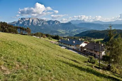 a view from a hill with mountains in the background at Gasthaus Bad Siess in Longomoso
