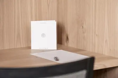 a white box sitting on top of a wooden table at Hotel Lichtenstern in Soprabolzano