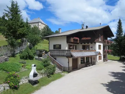 a house on a hill with a garden at Garni Juri in La Villa