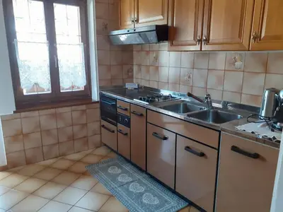 a kitchen with a sink and a stove at Casa Sicina in Sicina