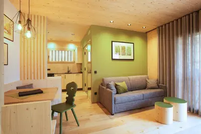 a living room with a couch and a table at Birkenhof in Marlengo