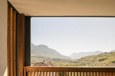a balcony with a view of a mountain view at Appartement KroneLiving in Tirolo