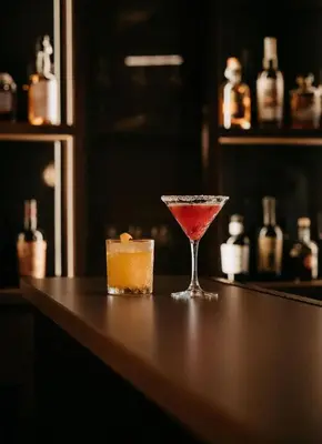 a drink in a martini glass sitting on a bar at Terentnerhof 4*S active & lifestyle hotel in Terento
