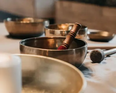 a group of copper bowls sitting on a table at Terentnerhof 4*S active & lifestyle hotel in Terento