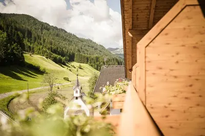 a balcony with a view of a mountain at Gasthof Jaufensteg in Racines