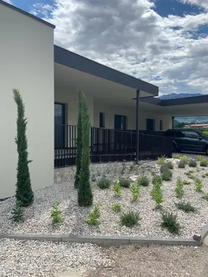 a house with plants in front of it at Apartments Klotz in Bolzano
