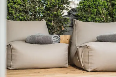 two pillows sitting next to each other on a table at Aquila Dolomites Residence in Ortisei