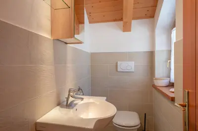 a shower in a bathroom with a tub at Weinberghof in Termeno