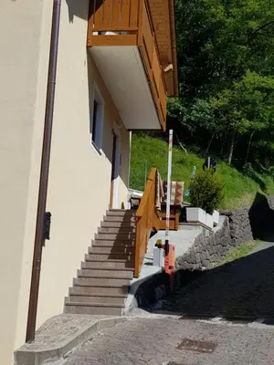 a set of stairs leading up to a house at Casa Alice 5.3 in Fiera di Primiero