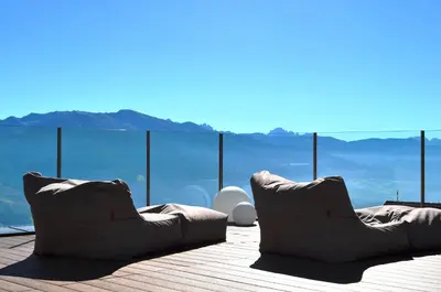 a window of a cabin with a view of a mountain at Hotel Kristall in Maranza