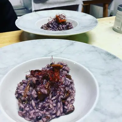 two white plates of food on a table at Albergo Lozen in Canale San Bovo