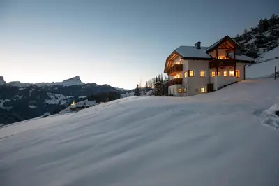 a view of a snow covered mountain from a balcony at Apartment Fedares in La Valle