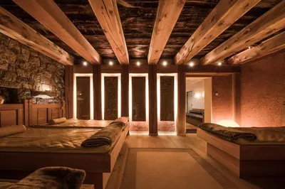 a large room with two beds and some windows at Hotel Dorner B&B in Lagundo
