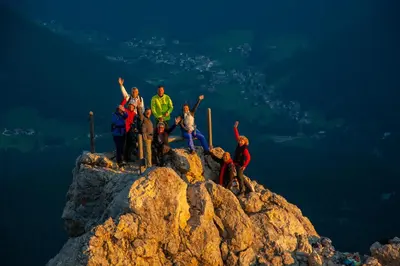 a group of people standing on top of a mountain at Moseralm Dolomiti Hideaway in Nova Levante