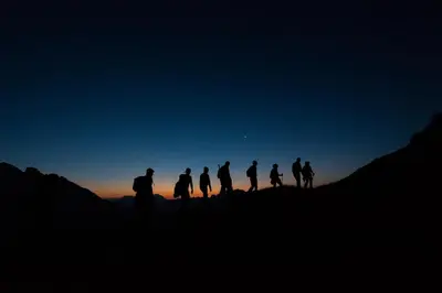 a group of people standing on top of a mountain at Moseralm Dolomiti Hideaway in Nova Levante