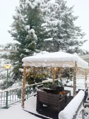 a gazebo with snow on top of it at Hotel Panda Cortina- ricarica auto elettriche in Cortina dʼAmpezzo