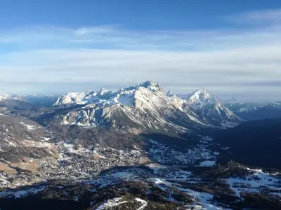 an aerial view of a snow covered mountain at La Roncolina in Cortina dʼAmpezzo