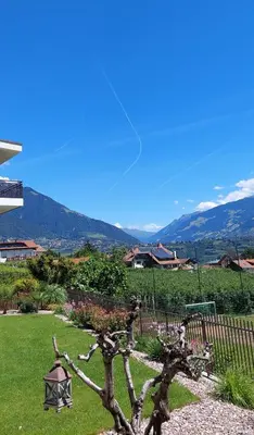 a view of the mountains from the window of a house at Marlingsuites - Vinea - Wieser Josef - Marling in Marlengo