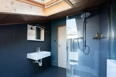 a bathroom with a sink and a shower at Gasthof Salurn in Salorno sulla Strada del Vino