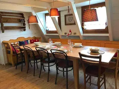 a sauna with three windows with red wine at Chalet Paoletta - Alpe Cermis in Cavalese