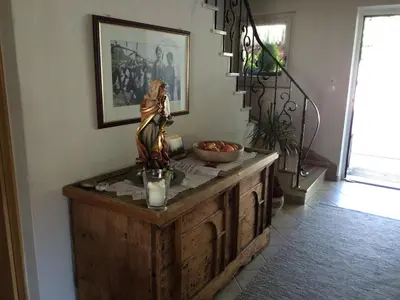 a statue of a woman sitting on top of a table at Hotel Garni Paler in Tirolo