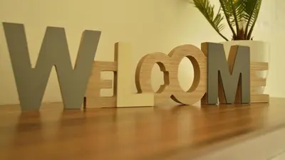 a wooden sign that says war room on a wooden floor at Family Apartment Julia in Termeno
