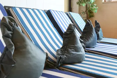 a group of pillows sitting on a couch at Hotel Dolomitenblick in Collalbo