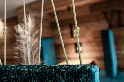 a close up of a black pot with ropes at Viel Nois Guest House in Funes