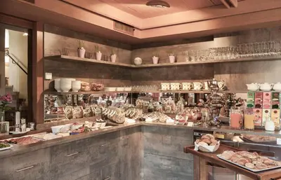 a kitchen with a counter with food on it at Raschötzhof in Funes