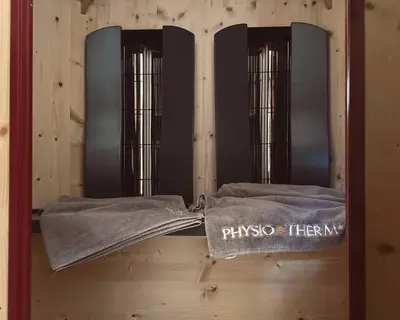 a pair of skis sitting on a wooden floor at Residence Neuhäuslhof in Merano