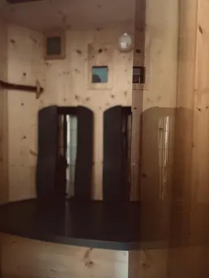 a room with a ping pong table in a gym at Residence Neuhäuslhof in Merano