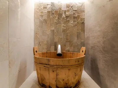 a sauna with two bunk beds in it at Mountain Home Villa Anna in Selva di Val Gardena