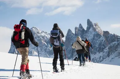 a group of people on skis on a mountain at Haus Tannenburg in Funes